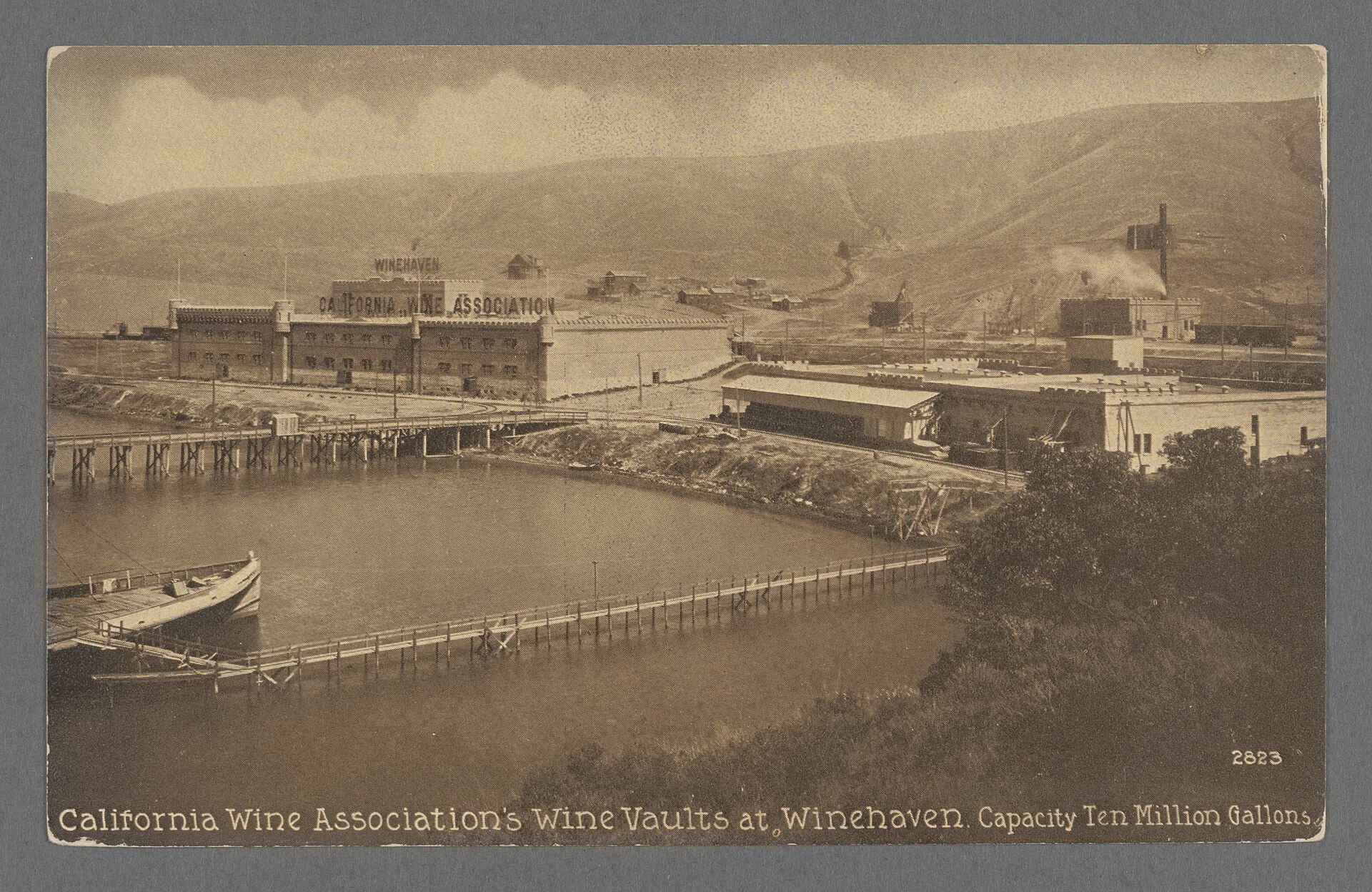 Historic postcard of the California Wine Association wine vaults at Winehaven, labeled capacity ten million gallons